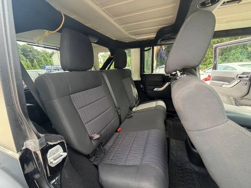 Used 2012 Jeep Wrangler Unlimited Rubicon w/ Dual Top Group AWD/4WD image 14