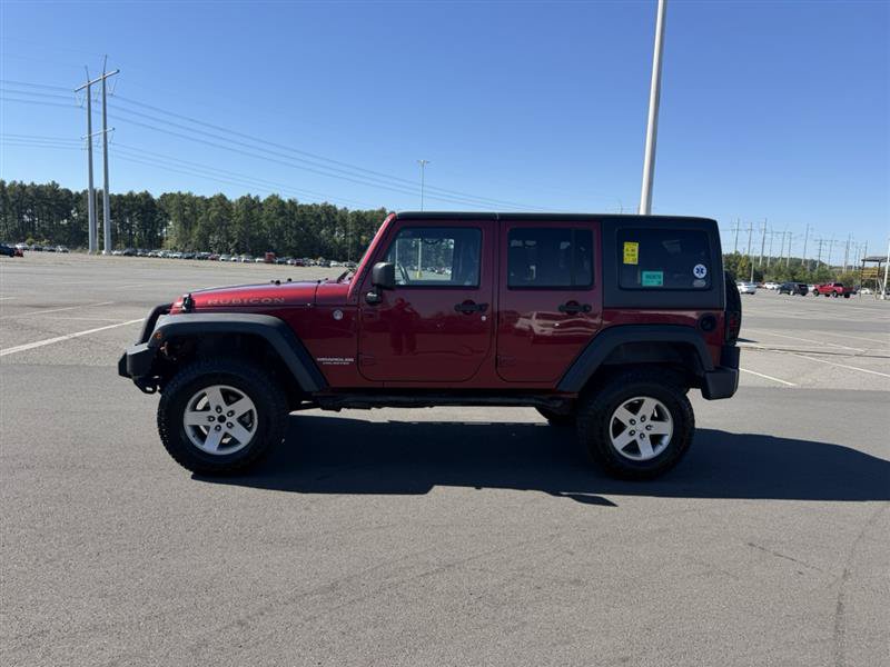 Used 2012 Jeep Wrangler Unlimited Rubicon w/ Dual Top Group AWD/4WD image 12