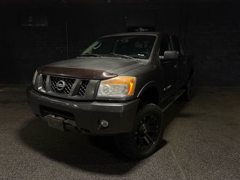 Used 2010 Nissan Titan PRO-4X AWD/4WD image 1