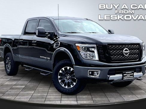 Used 2016 Nissan Titan PRO-4X AWD/4WD image 1