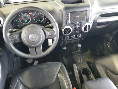 Used 2014 Jeep Wrangler Unlimited Sahara w/ Dual Top Group AWD/4WD image 11