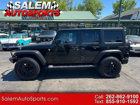 Used 2011 Jeep Wrangler Unlimited Sport AWD/4WD image 1