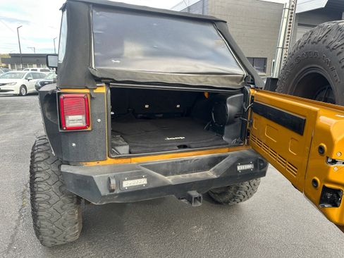 Used 2014 Jeep Wrangler Unlimited Rubicon w/ Dual Top Group AWD/4WD image 11