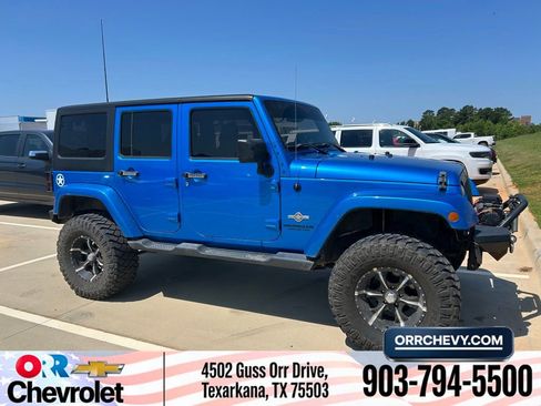 Used 2014 Jeep Wrangler Unlimited Sport AWD/4WD image 1