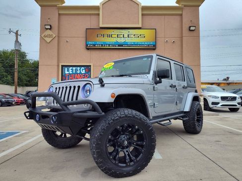 Used 2014 Jeep Wrangler Unlimited Sahara w/ Max Tow Package AWD/4WD image 1