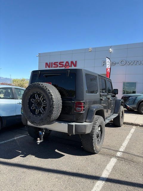 Used 2015 Jeep Wrangler Unlimited Sahara w/ Connectivity Group AWD/4WD image 14