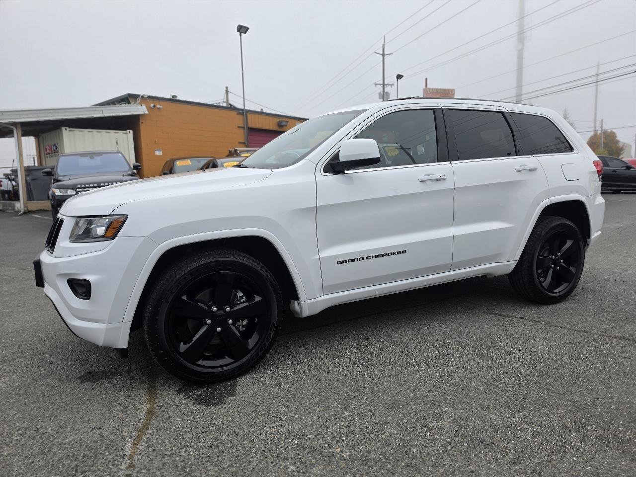 Used 2015 Jeep Grand Cherokee Altitude AWD/4WD image 10