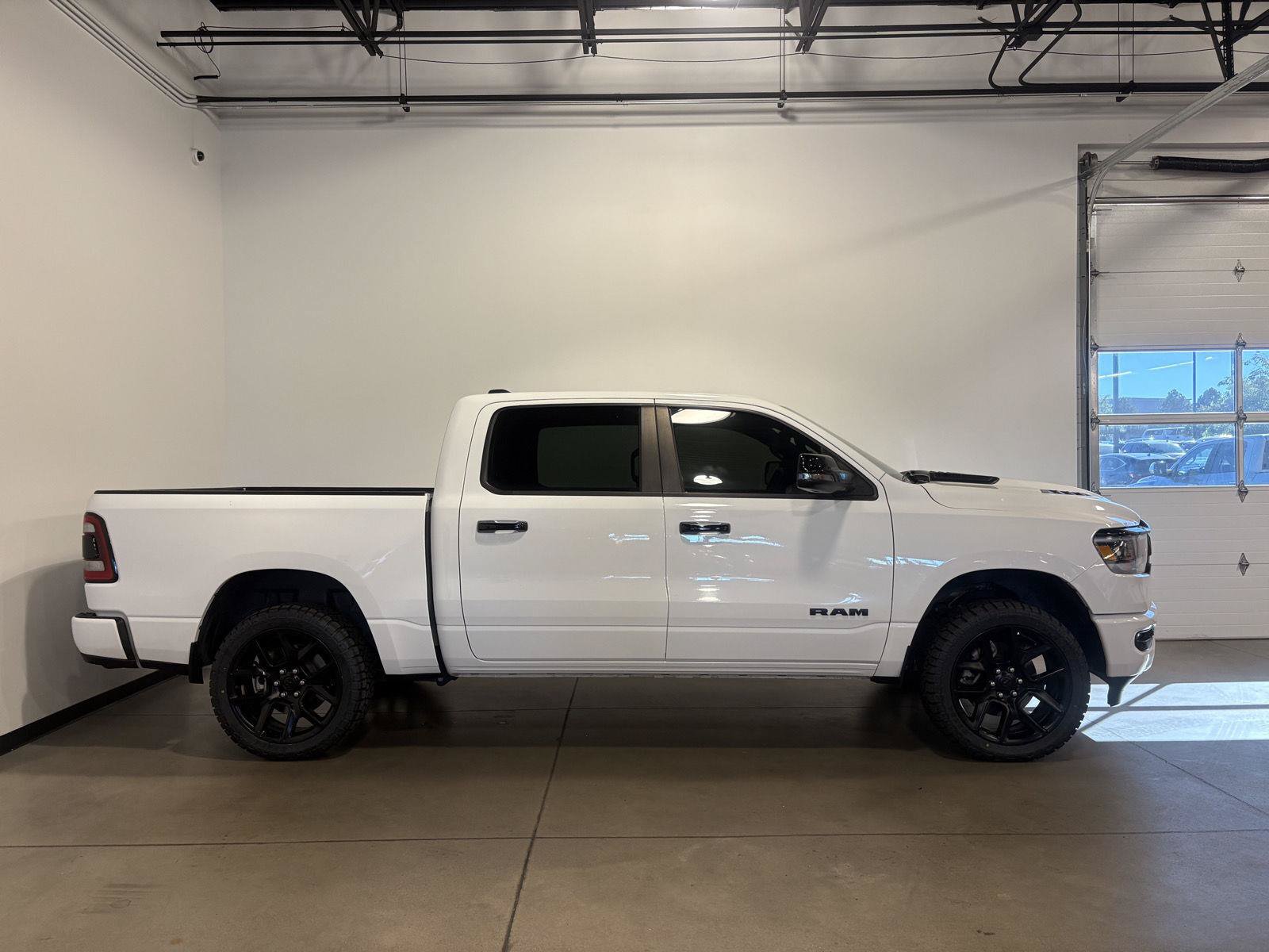 Used 2024 RAM 1500 Laramie AWD/4WD image 2