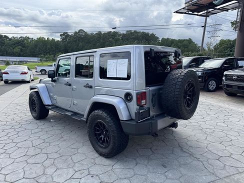 Used 2015 Jeep Wrangler Unlimited Sahara w/ Dual Top Group AWD/4WD image 10