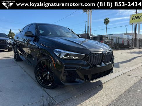 Used 2023 BMW X6 xDrive40i w/ M Sport Package image 1