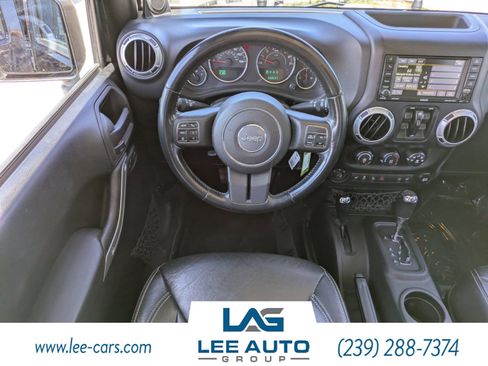 Used 2014 Jeep Wrangler Unlimited Sahara w/ Dual Top Group AWD/4WD image 13