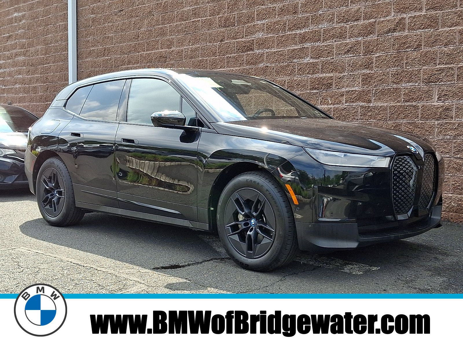 Certified 2024 BMW iX xDrive50 AWD/4WD image 1