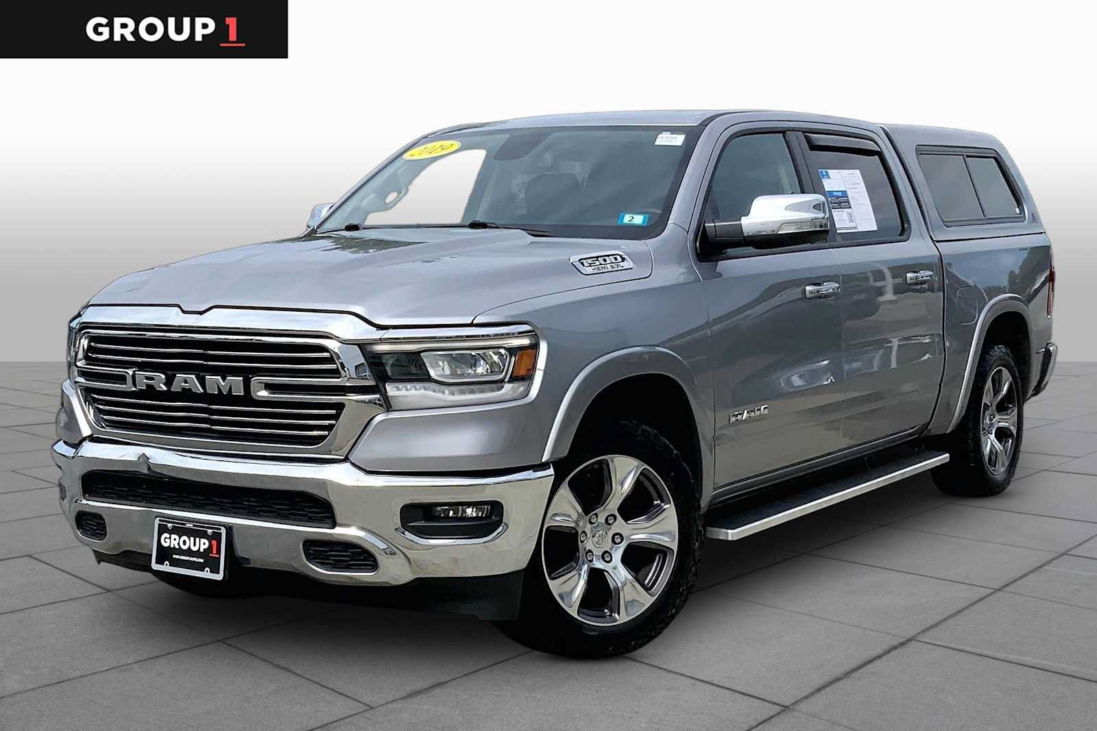 Used 2019 RAM 1500 Laramie AWD/4WD image 1