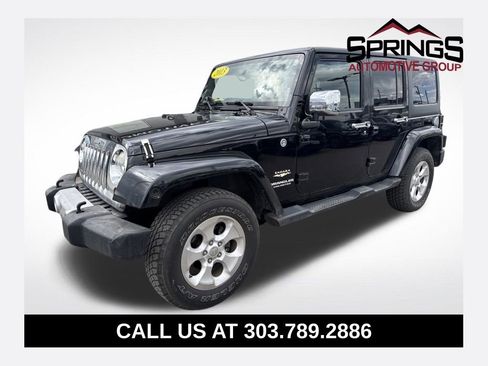 Used 2013 Jeep Wrangler Unlimited Sahara w/ Dual Top Group image 1