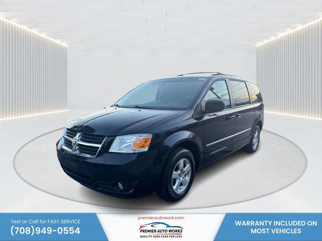 Used 2010 Dodge Grand Caravan SXT w/ Family Value Group FWD image 1