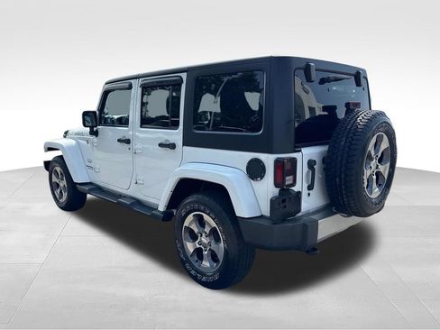 Used 2016 Jeep Wrangler Unlimited Sahara w/ Dual Top Group AWD/4WD image 4