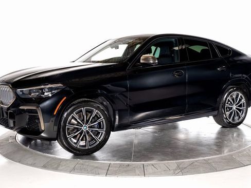 Used 2023 BMW X6 M50i w/ Parking Assistance Package image 1