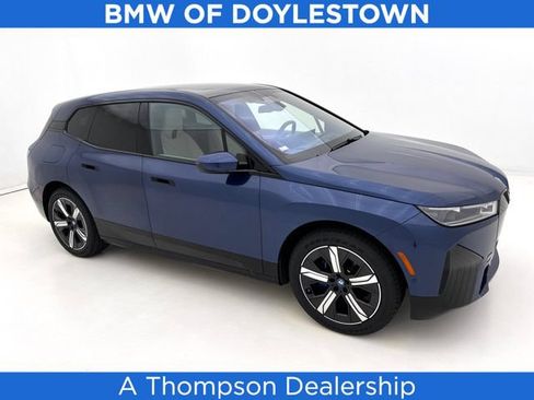 Used 2024 BMW iX xDrive50 w/ Premium Package AWD/4WD image 1