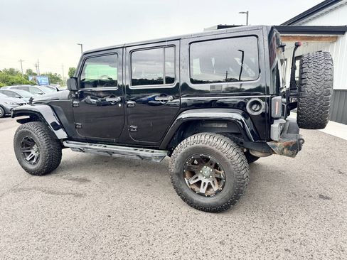 Used 2014 Jeep Wrangler Unlimited Rubicon w/ Dual Top Group AWD/4WD image 13
