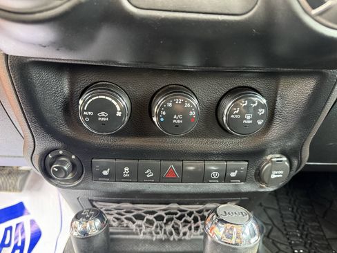Used 2013 Jeep Wrangler Unlimited Sahara w/ Dual Top Group AWD/4WD image 11