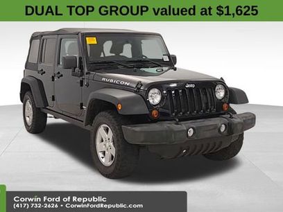 Used 2011 Jeep Wrangler Unlimited Rubicon w/ Dual Top Group