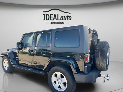 Used 2012 Jeep Wrangler Unlimited Sahara w/ Dual Top Group AWD/4WD image 4