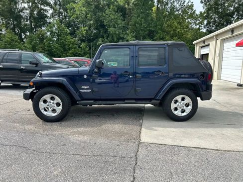Used 2013 Jeep Wrangler Unlimited Sahara w/ Dual Top Group image 10