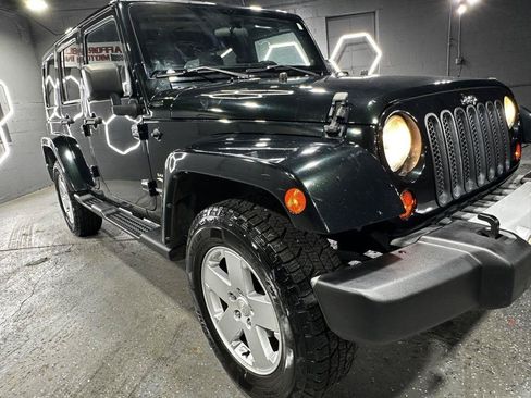 Used 2012 Jeep Wrangler Unlimited Sahara w/ Dual Top Group AWD/4WD image 43