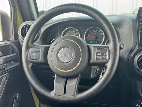 Used 2013 Jeep Wrangler Unlimited Sport w/ Mopar Black Appearance Group image 17