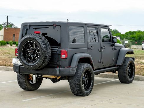 Used 2015 Jeep Wrangler Unlimited Sahara w/ Max Tow Package AWD/4WD image 9