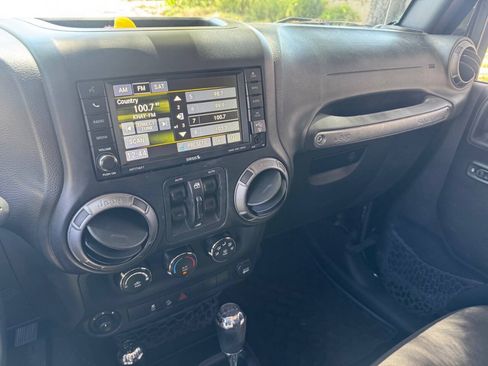 Used 2015 Jeep Wrangler Unlimited Sport w/ Dual Top Group AWD/4WD image 16