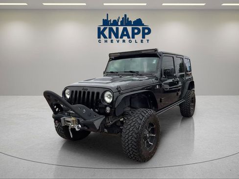 Used 2015 Jeep Wrangler Unlimited Sahara AWD/4WD image 1