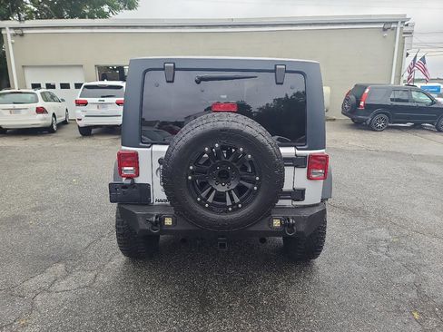Used 2012 Jeep Wrangler Unlimited Sport w/ Dual Top Group AWD/4WD image 6