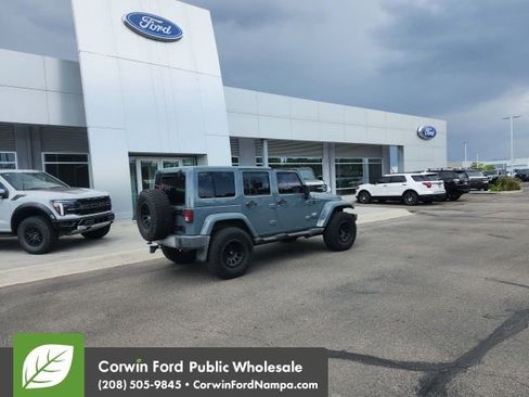 Used 2014 Jeep Wrangler Unlimited Sahara w/ Dual Top Group AWD/4WD image 6