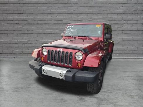 Used 2012 Jeep Wrangler Unlimited Sahara w/ Dual Top Group AWD/4WD image 3