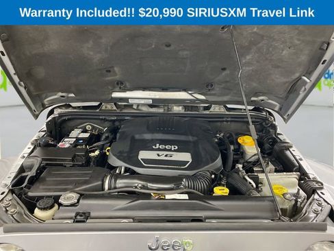 Used 2014 Jeep Wrangler Unlimited Sahara w/ Dual Top Group AWD/4WD image 12
