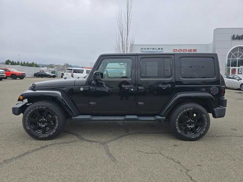 Used 2014 Jeep Wrangler Unlimited Sahara w/ Dual Top Group image 2