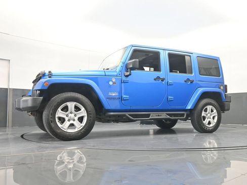 Used 2015 Jeep Wrangler Unlimited Sahara w/ Dual Top Group image 48