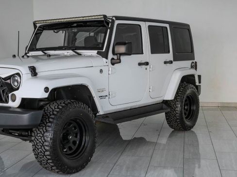 Used 2014 Jeep Wrangler Unlimited Sahara w/ Dual Top Group AWD/4WD image 47