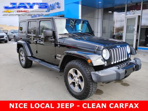 Used 2016 Jeep Wrangler Unlimited Sahara AWD/4WD image 1