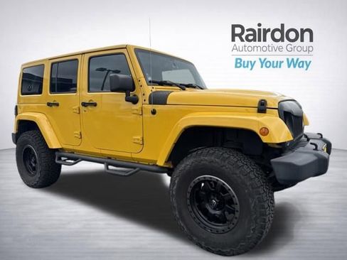 Used 2015 Jeep Wrangler Unlimited Sahara AWD/4WD image 1