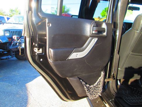 Used 2012 Jeep Wrangler Unlimited Rubicon w/ Dual Top Group image 11