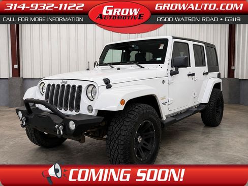 Used 2014 Jeep Wrangler Unlimited Sahara w/ Dual Top Group AWD/4WD image 1