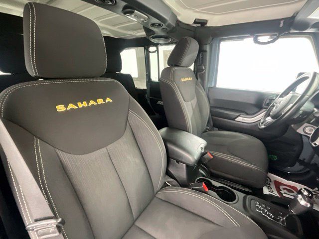 Used 2014 Jeep Wrangler Unlimited Sahara w/ Dual Top Group AWD/4WD image 14
