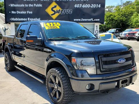 Used 2014 Ford F150 FX4 w/ Equipment Group 402A Luxury AWD/4WD image 1