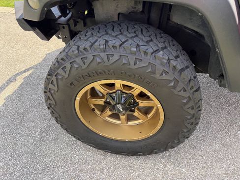 Used 2014 Jeep Wrangler Unlimited Rubicon w/ Dual Top Group AWD/4WD image 25