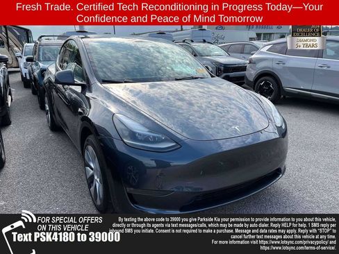 Used 2024 Tesla Model Y Long Range AWD/4WD image 1