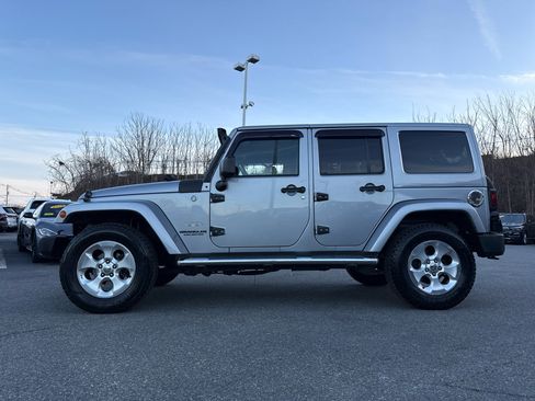 Used 2013 Jeep Wrangler Unlimited Sahara w/ Dual Top Group image 2