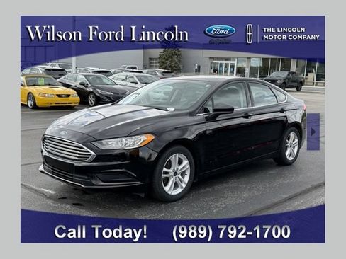 Certified 2018 Ford Fusion SE w/ Fusion SE Technology Package FWD image 1