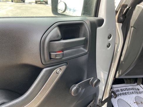 Used 2012 Jeep Wrangler Unlimited Sport w/ Black Appearance Group image 11